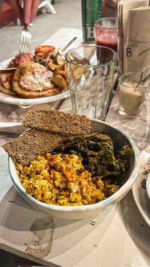 Tofu scramble with kale chips and raw crackers  at PURA in San Isidro