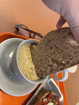 Dipping the bread in soup  at Daily Lucky 데일리럭키 in Busan