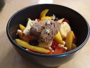 Menú del día: Mini ensalada de frutas con helado vegan at La Ruda Casa Cultural in Bogota