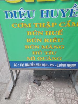 Menu sign outside at Cơm Chay Diệu Huyền in Ho Chi Minh City