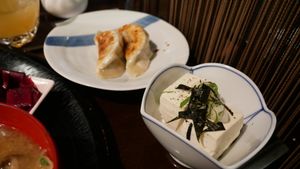 Side Dishes: Tofu - 300 Yen Gyoza - Two Piece 450 Yen
  at Komenoko in Tokyo
