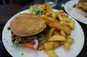 Caprice Burger with French Fries at Caprice Cafe in Paris