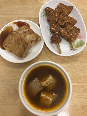 Radish cake, skewers of tofu and lions mane, stinky tofu soup  at Axia Ganma Store. Longshen Cuiguo - 籠神炊粿 in Kaohsiung