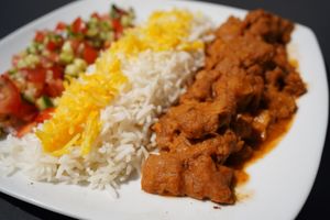 Golden Split Peas Stew (Khoresht Gheymeh) 
Yellow split peas and soy fillet, in tomato sauce, served with saffron topped rice & small fresh salad at Noush in Barcelona