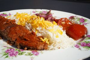 Pan Kebab (Kabab Tabei)                                   
Heura meat Kebab served with saffron-topped rice, grilled tomatoes, marinade purple onions at Noush in Barcelona