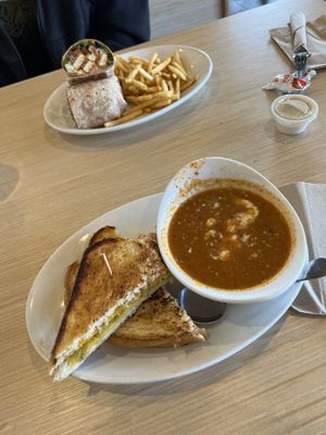 twister wrap with fries and pesto grilled cheese with tomato bisque  at Native Foods - Point Loma in San Diego