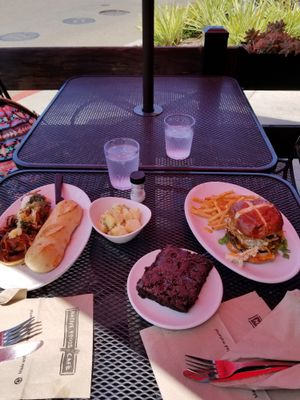 Poppin’ Jalapeño Burger
Two made-with-plants burger patties covered in melted Follow Your Heart® American cheese and topped with pickled jalapeños and made with plants jalapeño, pimento cheese. Served on a toasted pretzel bun with romaine lettuce, green goddess dressing, and crispy shallots. 
and
Meatball Sub
Spicy seitan meatballs, marinara, caramelized
onions, roasted red peppers, pumpkin seed
pesto, creamy ranch and parmesan. Served on
toasted baguette.  at Native Foods - Point Loma in San Diego