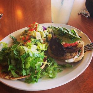 Portobello and Sausage Burger with a side of potato salad and lavender lemonade to wash it down! at Native Foods - Point Loma in San Diego