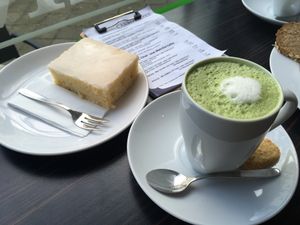 Vegan lemon cake and matcha latte at Carrot Cake in Dusseldorf