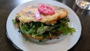 The Gordita is awesome! Ask no cheese or crema, sub cauliflower chorizo, add extra pickled red onions and hot sauce! at Fuego Tacos & Mezcal in Winchester