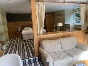 Bedroom & sofa area in Rowan at Yewfield in Ambleside