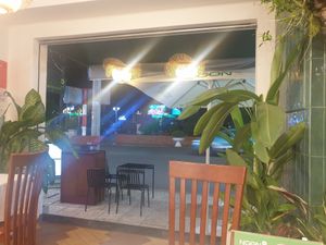 View from downstairs table at Ngon Vegan Bistro & Cafe in Can Tho