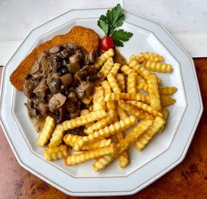 Restaurant Die Sonnenuhr: Schnitzel with mushroom cream sauce and fries €16 + €5  at Hotel Nicolay in Zeltingen-rachtig