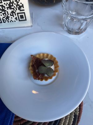 Amuse bouche, cashew cream and caramelized onion  at Yaya's Kitchen in London