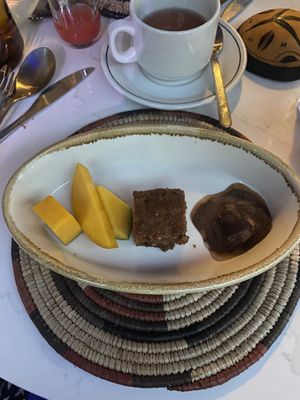 3 types of mango, carrot spiced cake, and spiced chocolate truffle  at Yaya's Kitchen in London