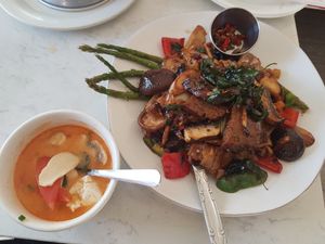 Tom kha soup and drunken mushroom noodles. at Araya's Place - Madison St in Seattle