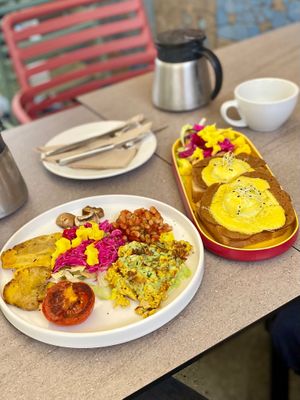 Breakfast plate and eggs benedict at Tranzit by Flow in Budapest