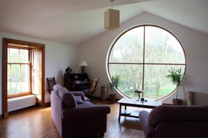 The Fuji Room - a Large Ensuite double room with a unique window to the world. at Over the Rainbow in Cardigan