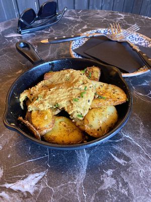 Potatoes with a mild curry sauce   at Bubita Bar in Barcelona