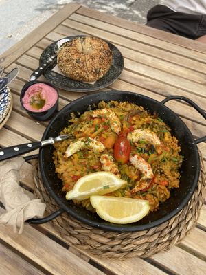 Seafood paella, bagel, hummus  at Bubita Bar in Barcelona
