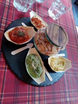 Selection of hummus, pesto, olives' paté... at Bubita Bar in Barcelona