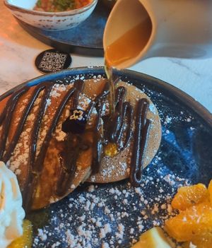 Pancakes with fruit and cream (roasted nuts omitted) at Bubita Bar in Barcelona