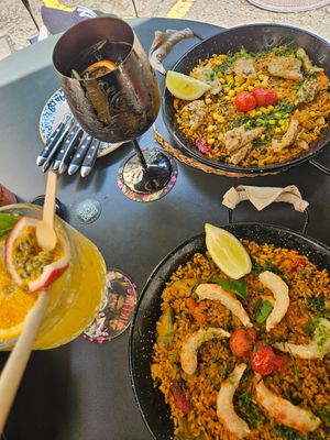 Monalisa and Morgana drinks. Faux seafood and chicken paellas at Bubita Bar in Barcelona