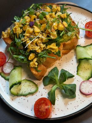 scrambled eggless toast with arugula and avocado at Bubita Bar in Barcelona