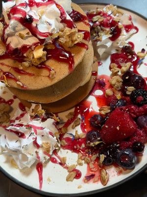 buckwheat pancakes with berries and wiped cream at Bubita Bar in Barcelona