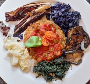 Chickpeas medallion and vegetables at Veganda in Padua