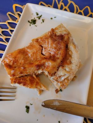 I cut a piece from this tasty lasagna before remembering my duties to our community (my appoligies) at Veganda in Padua