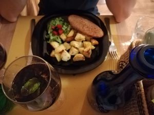 Breaded tofu cutlet with rosemary potatoes and a wine mojito  at Veganda in Padua