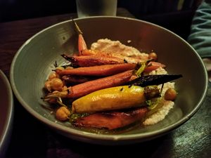 Heirloom carrots on a very bland macadamia puree. at Charlie Was a Sinner in Philadelphia