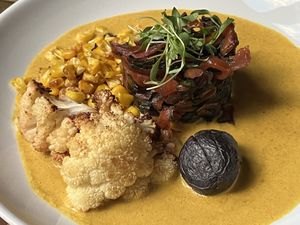 Sautéed chard & massaman curry  at Charlie Was a Sinner in Philadelphia