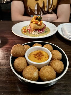 Fried Chicken in the back, Potato Croquettes in the front  at Charlie Was a Sinner in Philadelphia