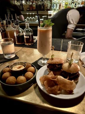 Potato croquettes and sliders   at Charlie Was a Sinner in Philadelphia