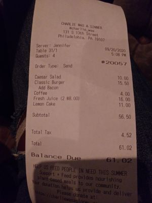receipt showing 11 dollars for a slice of dry nasty cake and 8 dollars for a glass of orange juice at Charlie Was a Sinner in Philadelphia