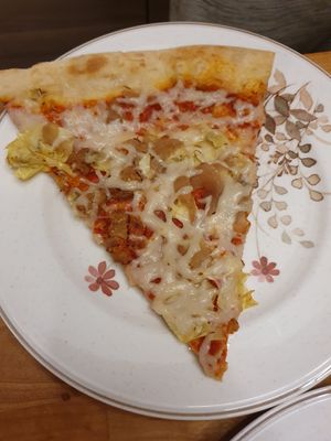 Delicious huge slice at Lazy Moon Pizza in Orlando