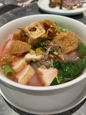 Our best-selling pink noodle soup! Made with beetroot-based broth, packed with toppings, and full of balanced, savory flavor – a must-try at every So Vegan branch.  at So Vegan - Phoenix Pratunam in Bangkok