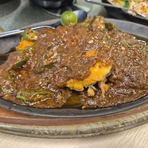 Sambal fish on hot plate at Nature Vegetarian Delights (NVD) Restaurant in Northeast Singapore