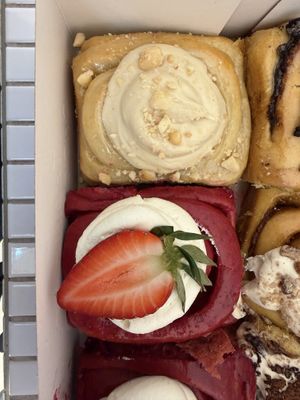 White chocolate macadamia & red velvet cinnamon rolls  at Cinnamood in Prague