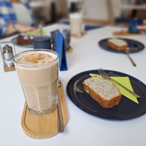 Latte Macchiato with oat milk, and vegan lemon poppy seed cake at Museums-Café Marktredwitz in Bayern