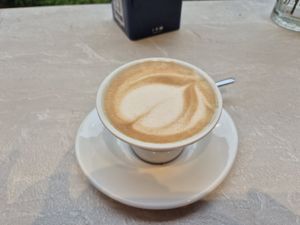 Cappuccino with oat milk at O:OPS CAFE’ in Lombardia