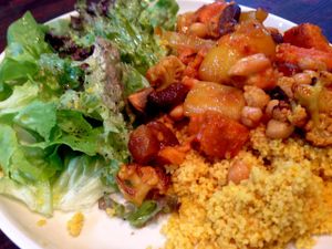 Every day during the week the store offers a different vegetarian main course for lunch. Here an example of Couscous with grilled vegetables, dried apricots and chickpeas, always accompanied by a small salad (all organic). at El Naturista in Frankfurt
