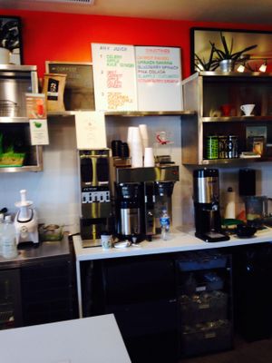 Menu board and prep area at PRESS in Washington