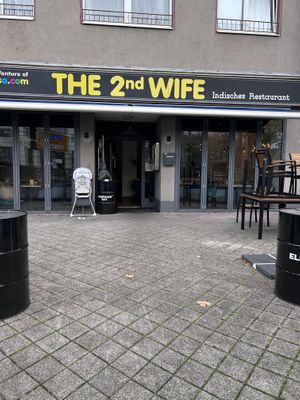 On busy cross section in residential area with public transit  at The 2nd Wife in Dusseldorf