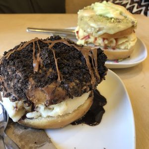 Oreo doughnut with white choc honeycomb ice cream; pistachio and orange doughnut with passion fruit ice cream   at Considerit in Edinburgh