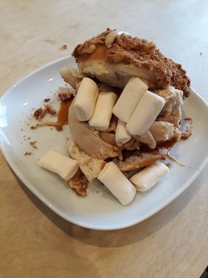 Biscoff donut crammed with Biscoff ice cream and marshmallows drizzled with caramel sauce at Considerit in Edinburgh