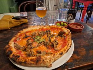 Parmigiana with vegan cheese. Smoked almonds and olives at The Pizzeria in Fort William