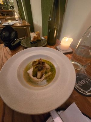White wine braised leek, basil oil, white bean hummus at Soots  in Manchester